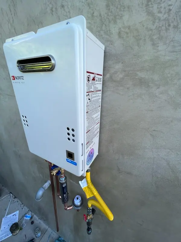 Tankless water heater installation for Swedetown Village homes